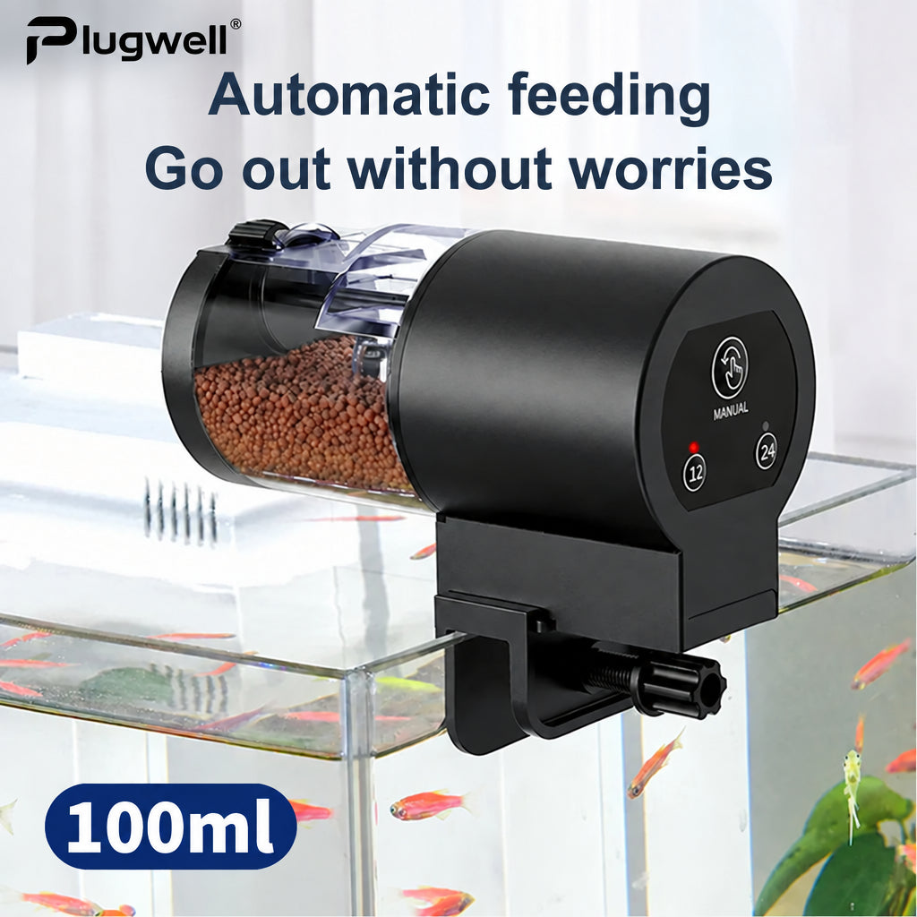 Plugwell Automatic Fish Feeder with a 100ml capacity mounted securely on the edge of a glass fish tank